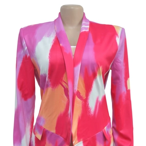 Detail of artistic abstract print and structured shoulder on long sleeve blazer