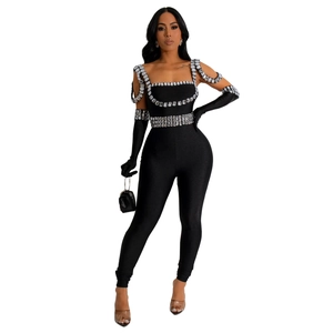 Sleeveless black jumpsuit with rhinestone crystals and matching long gloves for party wear