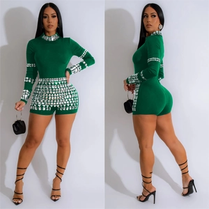 Slim fit dark green long sleeve romper with silver rhinestones for party wear