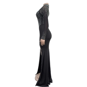 Detail of black rhinestone mesh dress featuring side slit and sparkling patterns