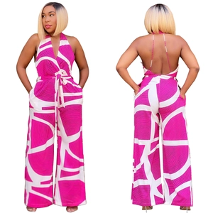 Detailed front and back view of magenta geometric print sleeveless wide-leg jumpsuit