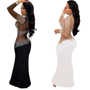 Elegant rhinestone evening dress in black and white with sheer mesh and fishtail hem