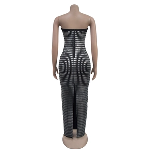Detailed back view of a black bodycon dress with silver sequins and a zipper closure