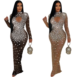 Detail of rhinestone evening gown with heart cutout and sheer mesh fabric textures
