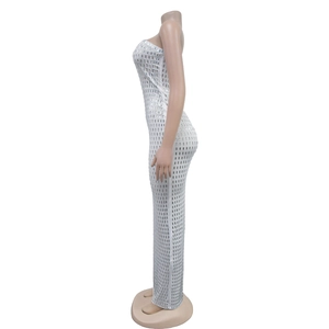 Detail of white strapless bodycon dress featuring vertical silver sequin embellishments