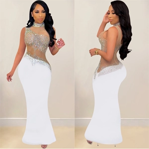 Elegant white mermaid evening gown with rhinestone mesh top and sleeveless high neck design