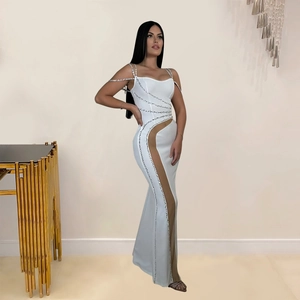 Elegant white slim fit evening gown with silver sequins and mesh patchwork detail