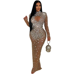 Detail of sheer mesh dress featuring sparkling silver rhinestones and heart chest cutout