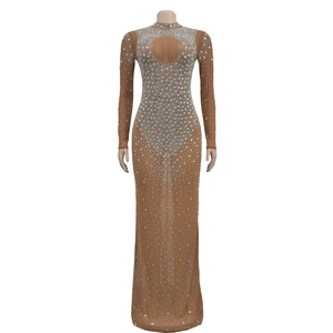 Detailed view of long sleeve evening gown featuring mesh rhinestones and chest cutout