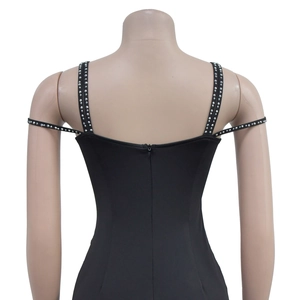 Detail of black rhinestone spaghetti straps and back invisible zipper on mesh dress