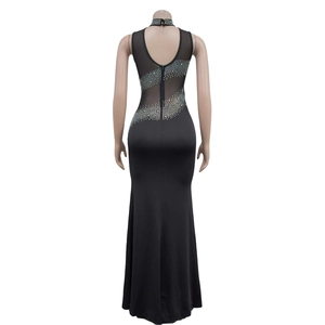 Detail of sheer black mesh back on evening dress with sparkling silver rhinestones