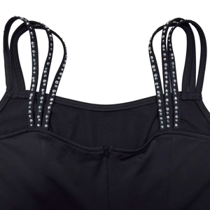 Detail of black rhinestone spaghetti straps and a back zipper on a mesh dress