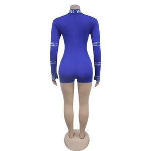 Rear view of blue long sleeve bodysuit featuring rhinestone trim and hidden back zipper