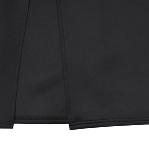 Macro detail of the double-needle stitching and flat matte fabric on a black dress
