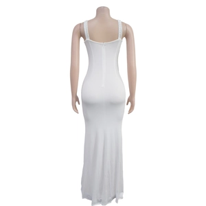 Detailed view of the sparkling rhinestone shoulder straps on a white mermaid evening dress