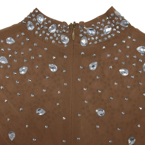 Detail of coffee mesh dress neckline featuring rhinestones, pear-shaped gems and hidden zipper
