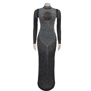 Detail view of black mesh dress featuring sparkling silver rhinestones and chest cutout design