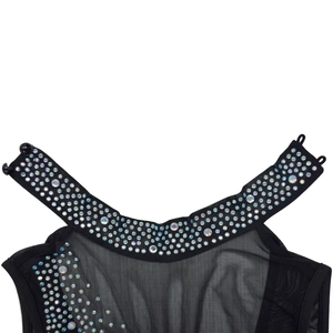 Detail of high neck mesh dress with sparkling rhinestones and elegant side buttons