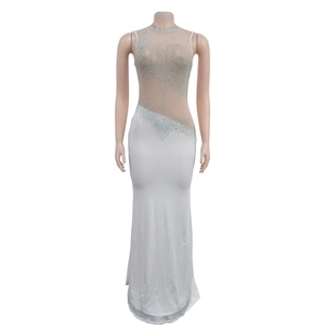 Detail of white fisheye evening dress featuring silver rhinestones on mesh bodice