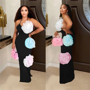 Elegant black halter maxi dress for women featuring three large 3D floral appliqués details