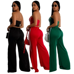 Ensemble femme deux pièces avec crop top et pantalon large à rayures latérales