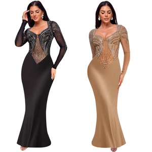 Detailed view of shimmering rhinestones on black and nude fishtail evening dresses