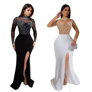 Detail view of rhinestone geometric patterns on long sleeve split evening dress