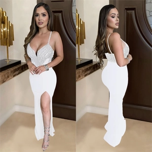 Elegant white sleeveless deep V-neck maxi dress with sparkling rhinestones and high slit