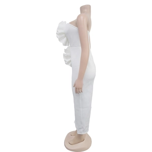 Detail shot of elegant white ruffled side trim on a slim fit sleeveless dress