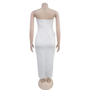 Detail view of the white strapless maxi dress back with zip and side ruffle design