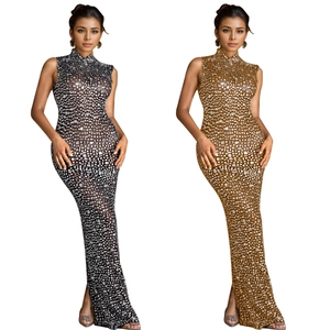 Detail of high-density sequins and rhinestone embellishments on a sleeveless maxi dress