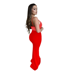 Detail of red sleeveless V-neck maxi dress with sparkling silver sequins and side slit