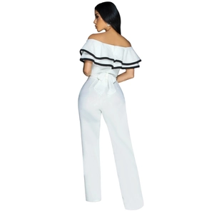 Detail of the back view showing a white off-shoulder jumpsuit with black edge ruffles