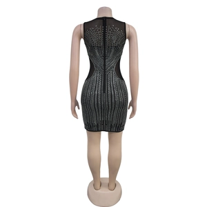 Detailed back view of a black sleeveless mini dress with radiant silver rhinestones