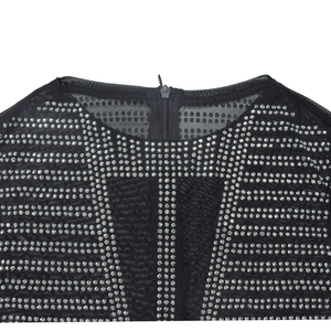 Detail view of round neck mesh dress with silver rhinestones and invisible back zipper