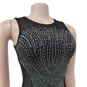 Detail view of the rhinestones on a sleeveless black mesh bodysuit for women