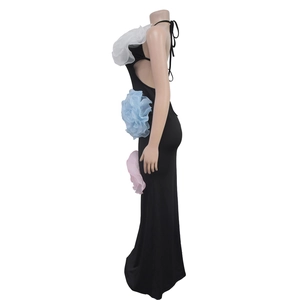 Detail of elegant black halter dress featuring three large 3D organza floral appliques