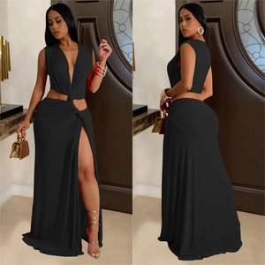 Elegant black sleeveless maxi dress with deep V-neck, waist cutout, and high side slit