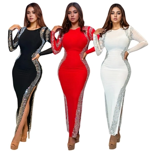 Detail of slim fit long sleeve dress with sparkling sequins and side split for evening party