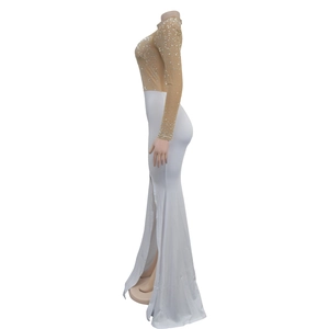 Side view detail of a long dress with rhinestone mesh bodice and high side slit