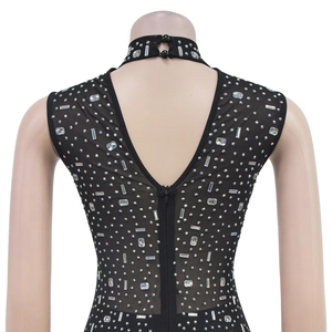 Close-up of high neck fastener and back opening with silver rhinestones on mesh dress