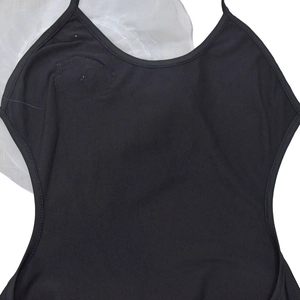 Detail of black sleeveless bodysuit with white mesh fabric and delicate shoulder straps