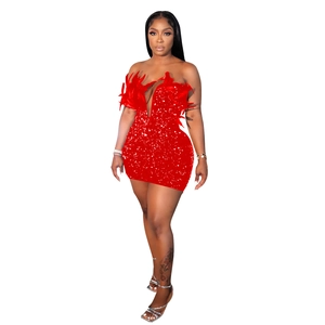 Detailed view of red sequin mini dress featuring elegant feather trim and strapless design