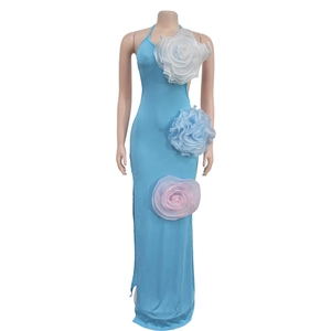 Detail of light blue halter neck dress featuring three large 3D organza floral appliques