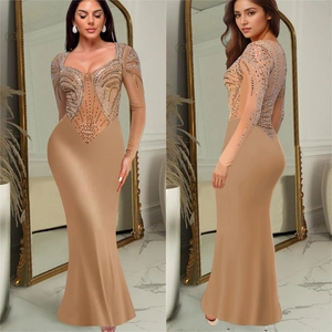 Elegant beige floor-length evening gown with long sleeves and sparkling sequin patterns