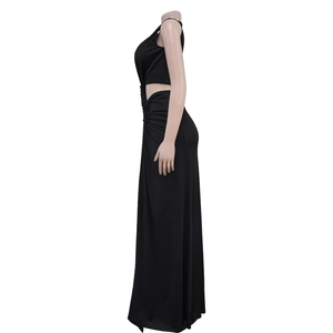 Detail of ruched side cut-out on a slim fit black sleeveless maxi dress for women