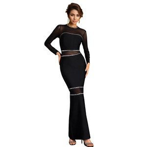 Slim fit black maxi dress with sheer mesh panels and sparkling rhinestone accents