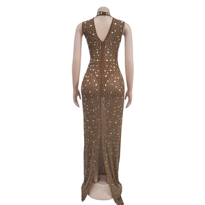 Detailed back view of sleeveless brown maxi dress with rhinestones and rear slit
