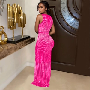 Detail of hot-fix rhinestones on a slim-fit rose pink sleeveless maxi evening dress