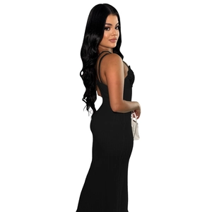 Detail of the elegant black knitted maxi dress with delicate lace neckline and slim straps